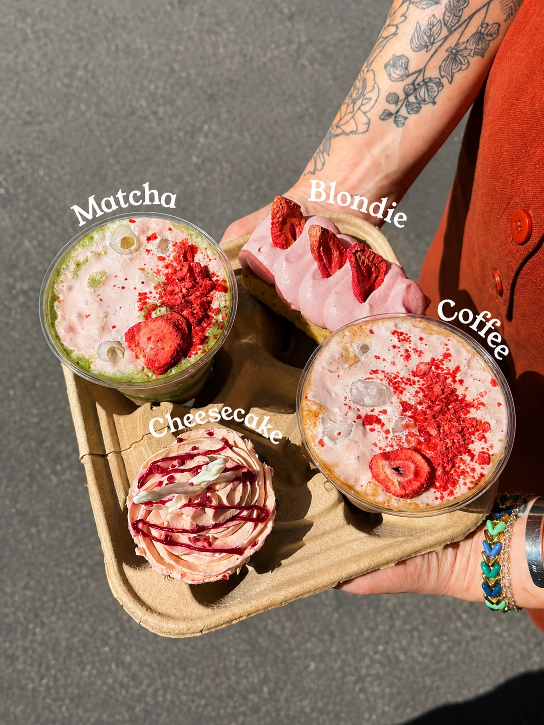 Matcha and coffee drinks with strawberry-topped treats